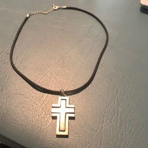 Black necklace with metallic cross